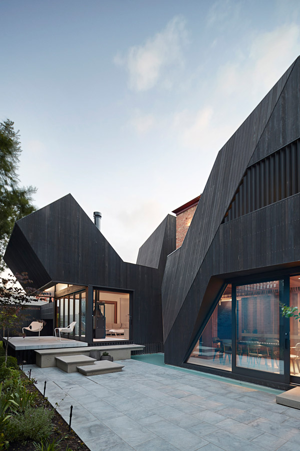Overend Constructions, Hatherlie, exterior feature, black timber cladding, glass doors, paving, Andrew Simpson Architects