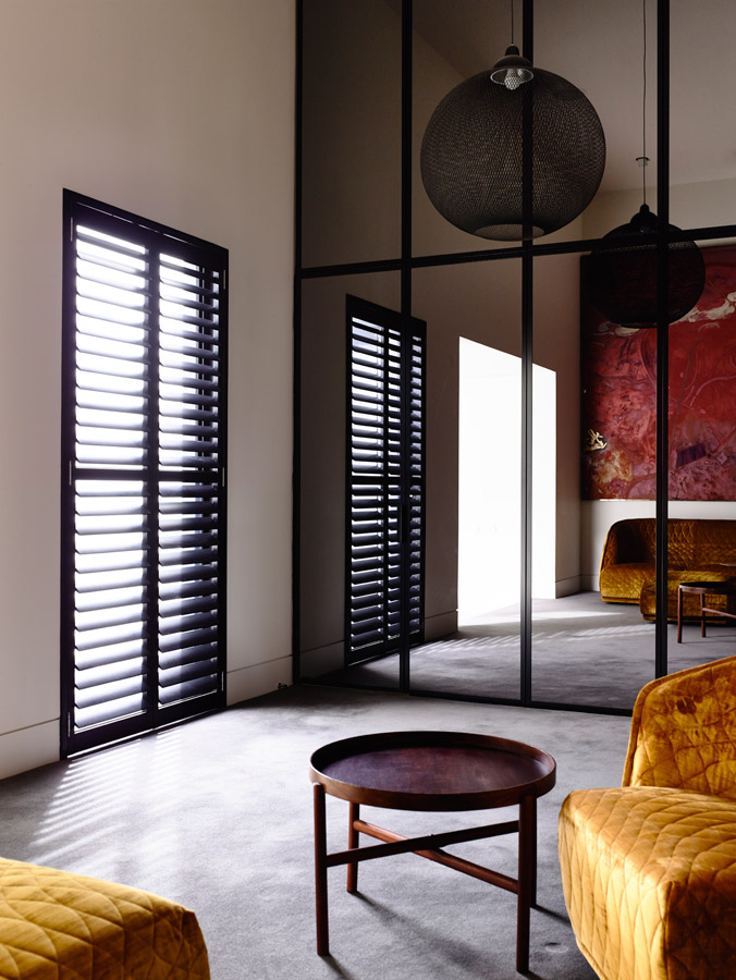 Overend Constructions, St Kilda West House, Kennedy Nolan, sitting room, mirror wall, plantation shutters